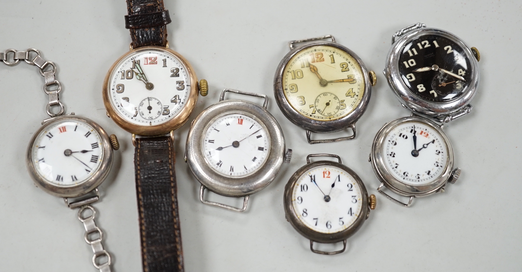 A gentleman's early 20th century 9ct gold manual wind wrist watch and six other wrist watches including silver.